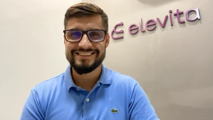 Imagem de Christian, da Elevita, sorrindo.